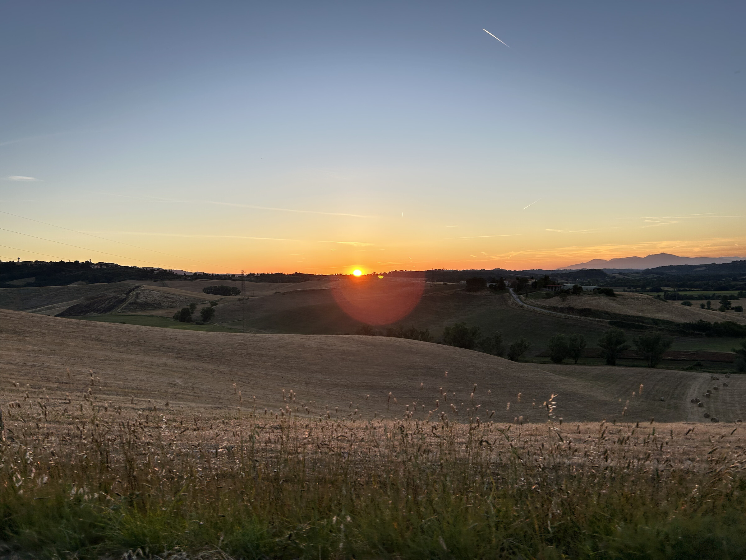 Tuscan hills at sunset near Lajatico and Teatro del Silenzio