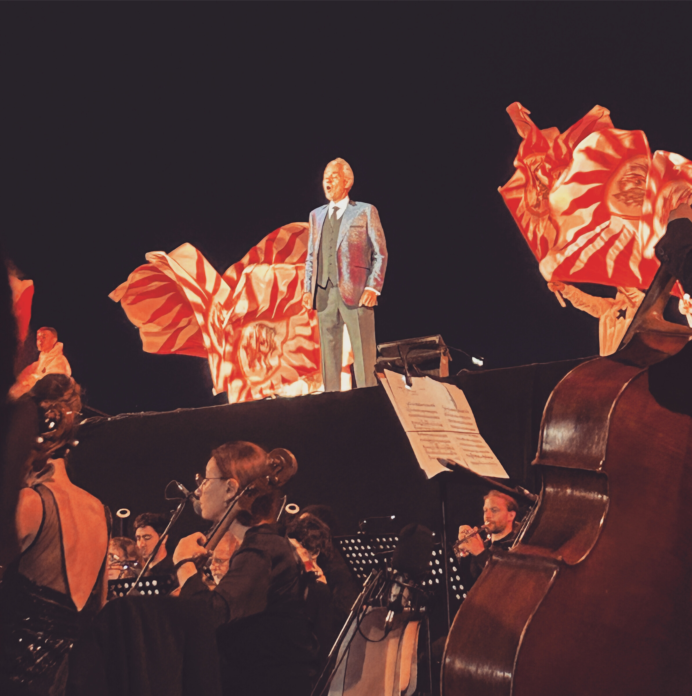 Andrea Bocelli performing with the orchestra at Teatro del Silenzio in Lajatico
